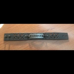 Leather statement bracelet with floral design